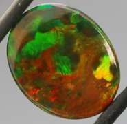 Magnificent 4.70ct full body flashing Semi Black Opal