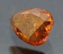 One of a kind! .37ct amber Diamond