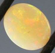 Brilliant flashing 1.83ct semi-black Opal