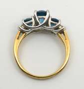 Stylish Ring with 3 Oval Blue Topaz