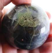 Substantial 1,611ct sphere cut galaxy patterned Iolite