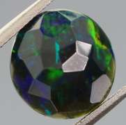 Glittering multi pattern flashing 1.84ct Welo black Opal
