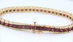 Attractive Yellow Gold Garnet Channel Set Bracelet
