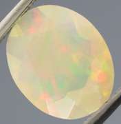 Excellent glittering 1.88ct faceted Jelly Opal