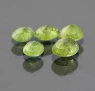Eye catching 3.70ct untreated Demantoid Garnet set