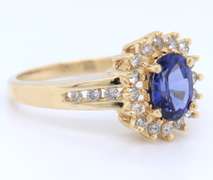 Romantic Yellow Gold oval Shaped Tanzanite and Diamond Ring