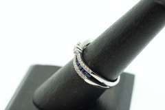 Flowing Channel Set 18k White Gold Sapphire and Diamond Ring with Triple-Stone Center