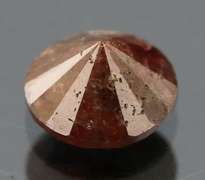 Eye catching 1.05ct round cut red Diamond solitaire