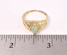 Ornate Green Stone Ring in Yellow Gold
