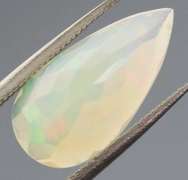 Wonderful glittering collectors 1.82ct faceted Jelly Opal