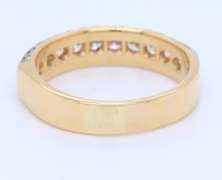 Elegant Yellow Gold 2.55ctw Channel Set Diamond Band