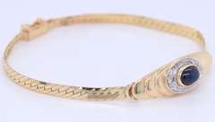 Lovely Yellow Gold Cab Oval Sapphire and Diamond Halo Bracelet