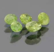 Eye catching 3.70ct untreated Demantoid Garnet set