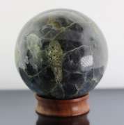 Substantial 1,611ct sphere cut galaxy patterned Iolite