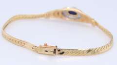 Lovely Yellow Gold Cab Oval Sapphire and Diamond Halo Bracelet
