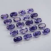Stunning 4.08ct high luster blue violet Iolite set