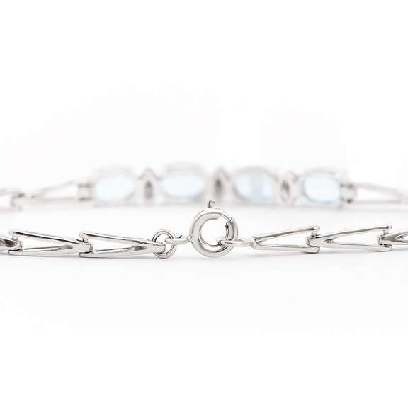 Plated Rhodium 2.80ctw Blue Topaz and Diamond Bracelet