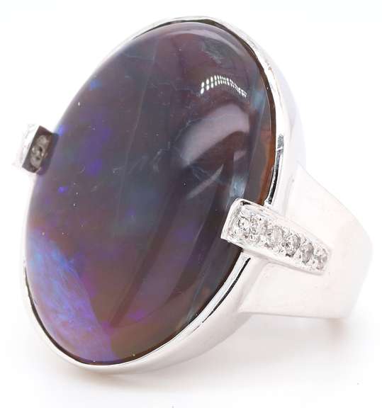 8.75ct Oval Opal and 0.25ctw Diamond Ring in 14K