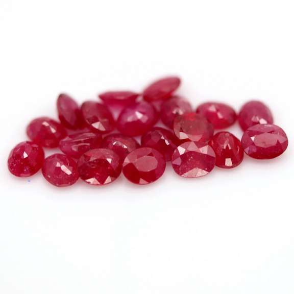 Vibrant 9.14ct oval cut imperial red Ruby set