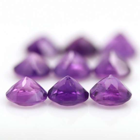 Glittering 10.78ct round cut Brazilian Amethyst set