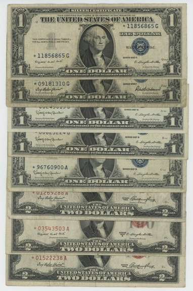 Lot of 8 assorted $1 and $2 STAR Notes