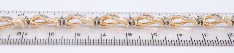 Majestic Yellow Gold Baguette and Diamond Crossover Bracelet