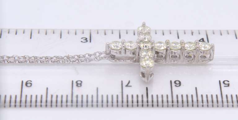Delightful White Gold approximate 1.10ctw Prong Set Diamond Cross Pendant on Chain