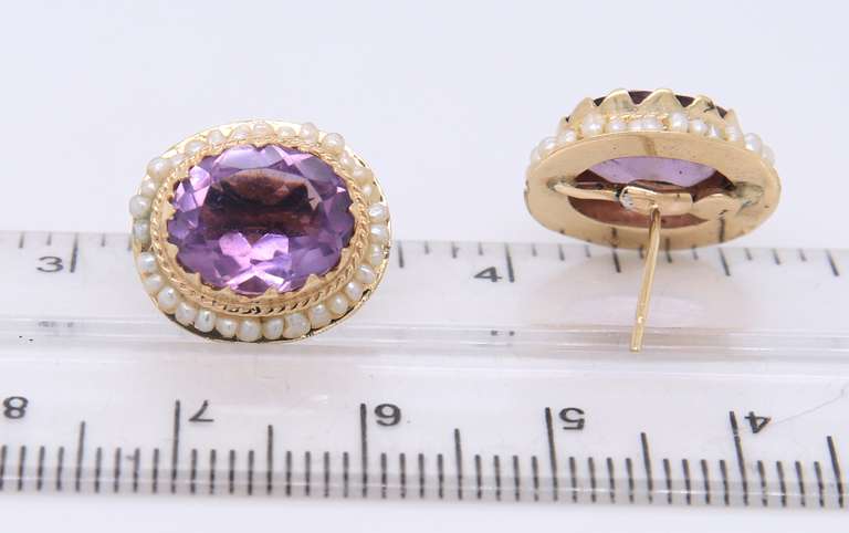 Vintage Yellow gold approximate 4.40ctw oval Amethyst and Seed Pearl Earrings