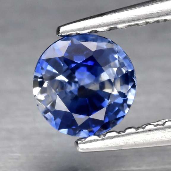 Heated only! 0.46ct bi-color calico Ceylon Sapphire solitaire