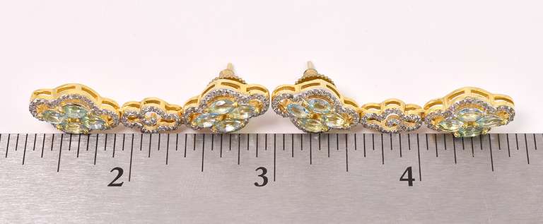 Fantastic 2.00CTW Sky Blue Topaz & 1.33CTW Diamond Dangle Earrings in Gold Plated Sterling Silver