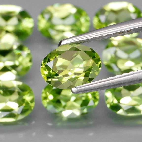 Dazzling 7.37ct untreated apple green Peridot set