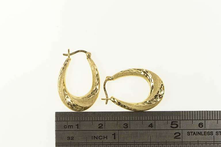14K Yellow Gold Diamond Cut Retro Puffy Twist Oval Hoop Earrings