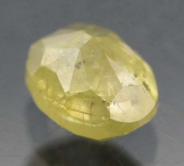 Eye catching .57ct oval cut yellow Diamond
