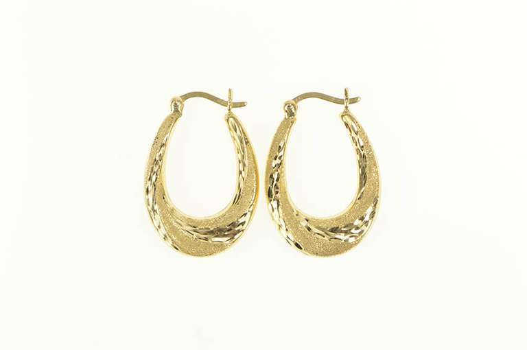 14K Yellow Gold Diamond Cut Retro Puffy Twist Oval Hoop Earrings