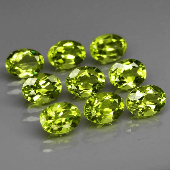 Dazzling 7.53ct untreated apple green Peridot set