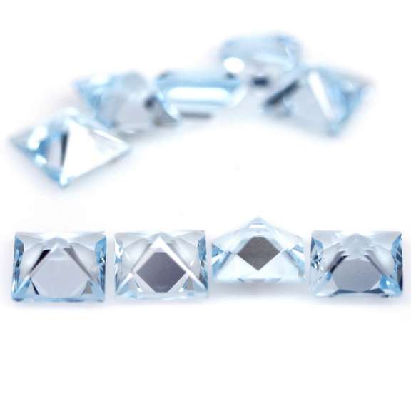 Amazing 10.61ct radiant cut ice blue Topaz set
