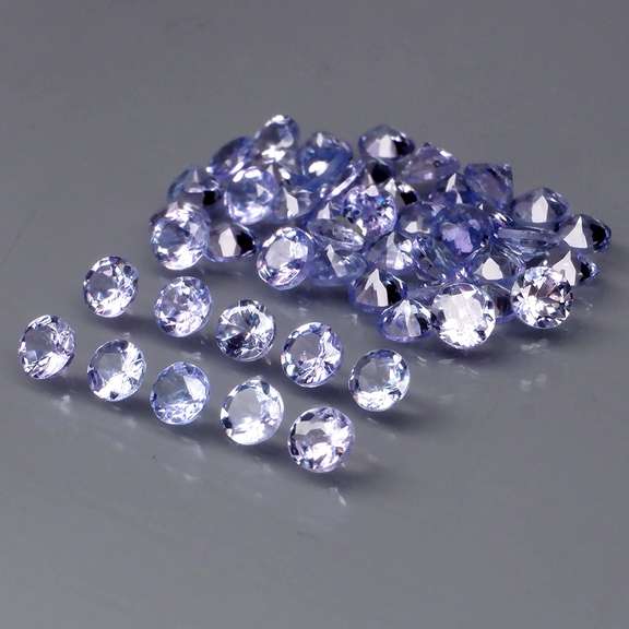 Heavy flashing 3.56ct diamond cut Tanzanite set