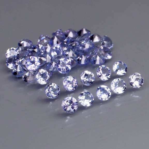 Heavy flashing 3.26ct diamond cut Tanzanite set