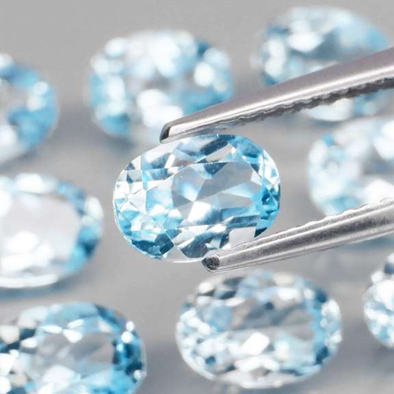 Matched! 12 piece 9.25ct full fire sky blue Topaz set