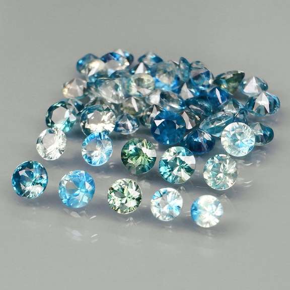 Heated only! 4.25ct blue green Sapphire set
