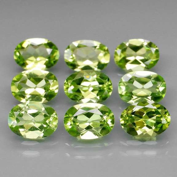 Dazzling 7.37ct untreated apple green Peridot set
