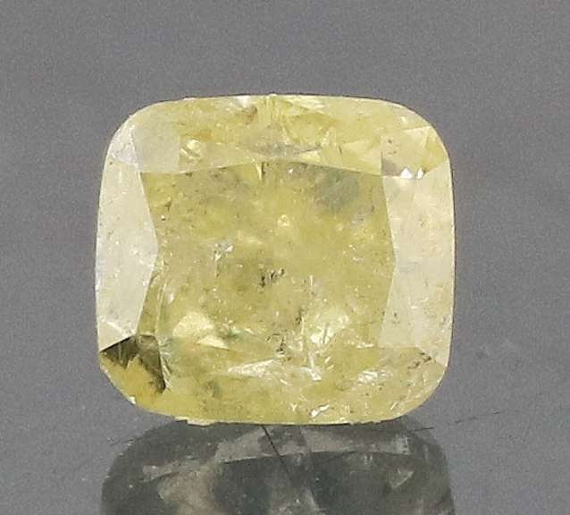 Beautiful .23ct cushion cut yellow Diamond