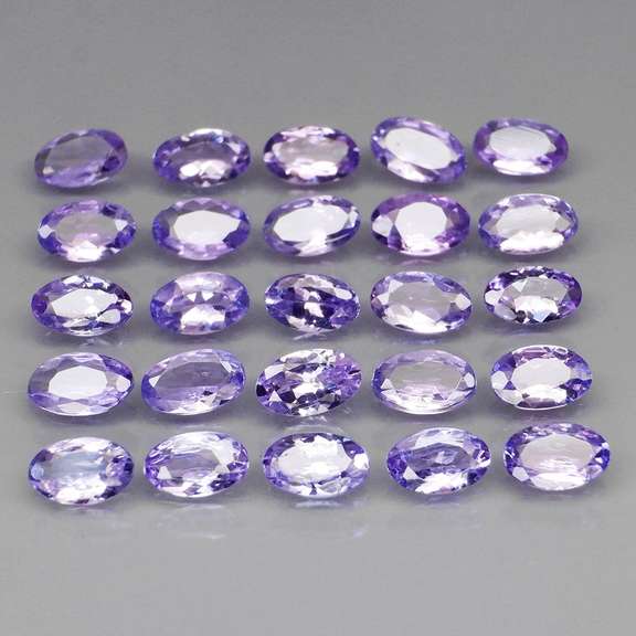 Glittering 5.19ct bright blue violet Tanzanite set