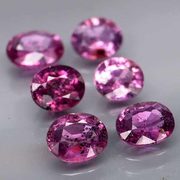 Fancy color 5.15ct UNHEATED Sapphire set
