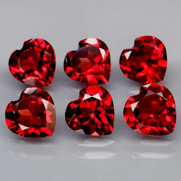 Premium 5.70ct heart cut cherry red Garnet set