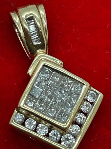 14K YELLOW GOLD PENDANT WITH 0.75 CARAT OF DIAMONDS