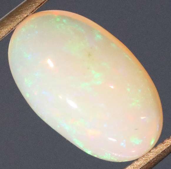Captivating 1.70ct rainbow flashing Welo Opal