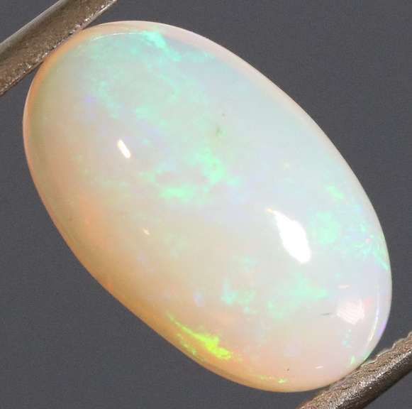 Captivating 1.70ct rainbow flashing Welo Opal