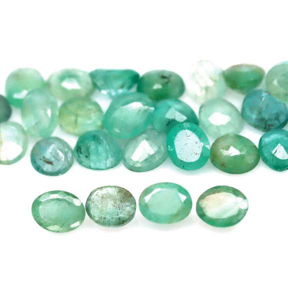 Oval cut 10.02ct Zambian Emerald set
