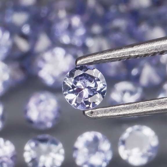 Heavy flashing 3.23ct diamond cut Tanzanite set